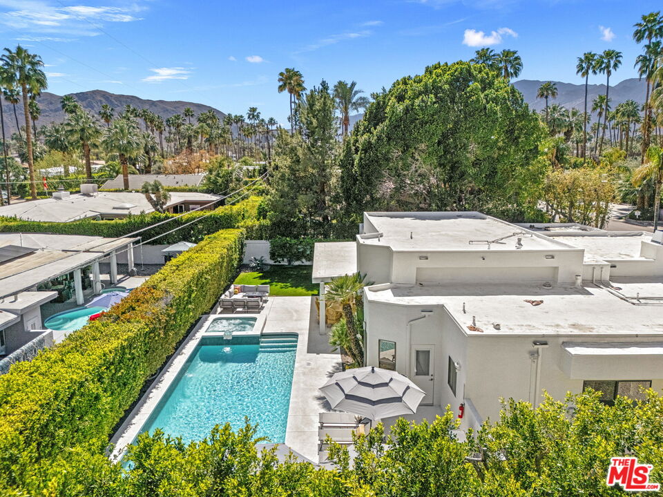 a view of a house with a swimming pool