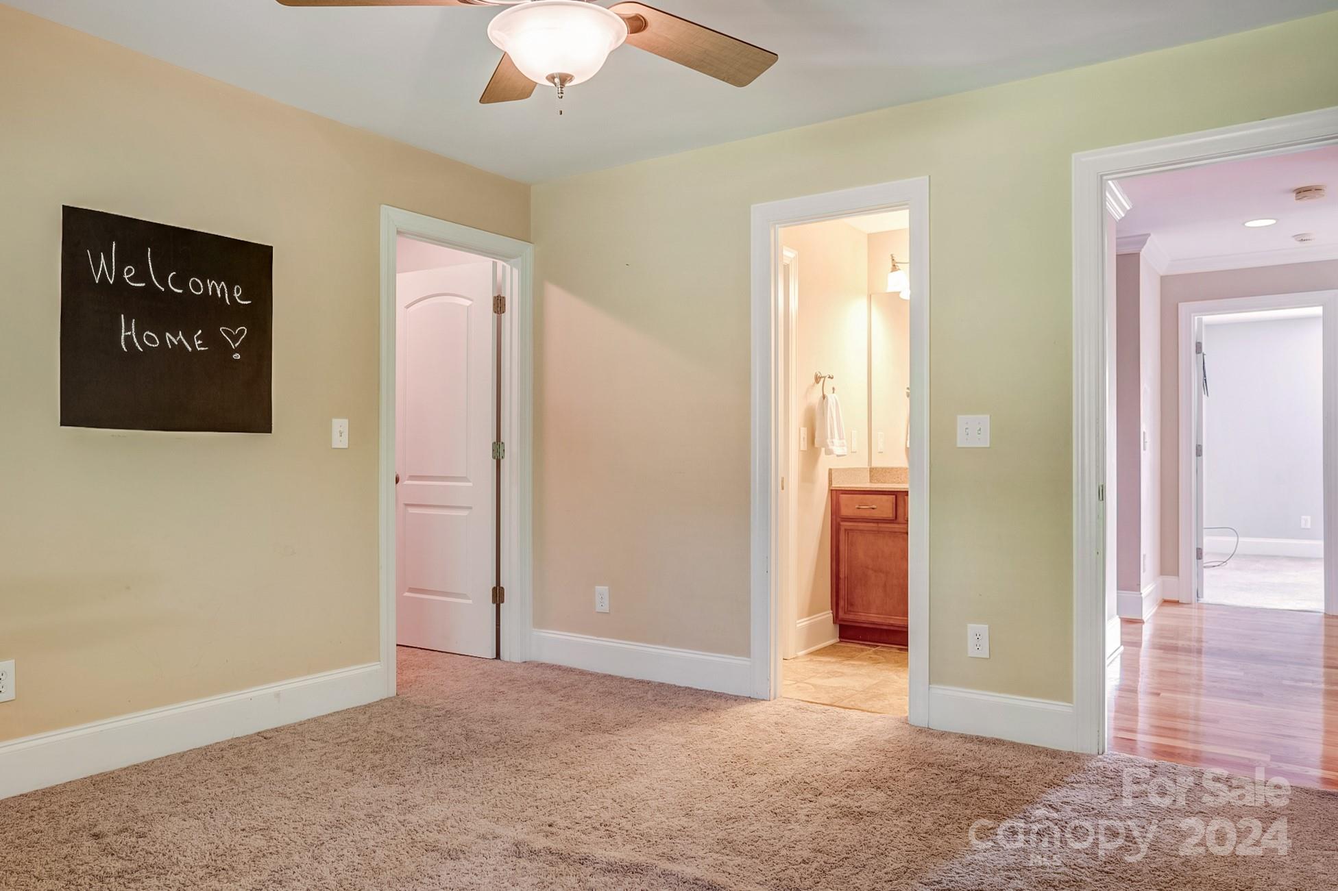 693 Normandy Road Mooresville, NC 28117 - Photo 36 of 48 an empty room with closet and a hallway