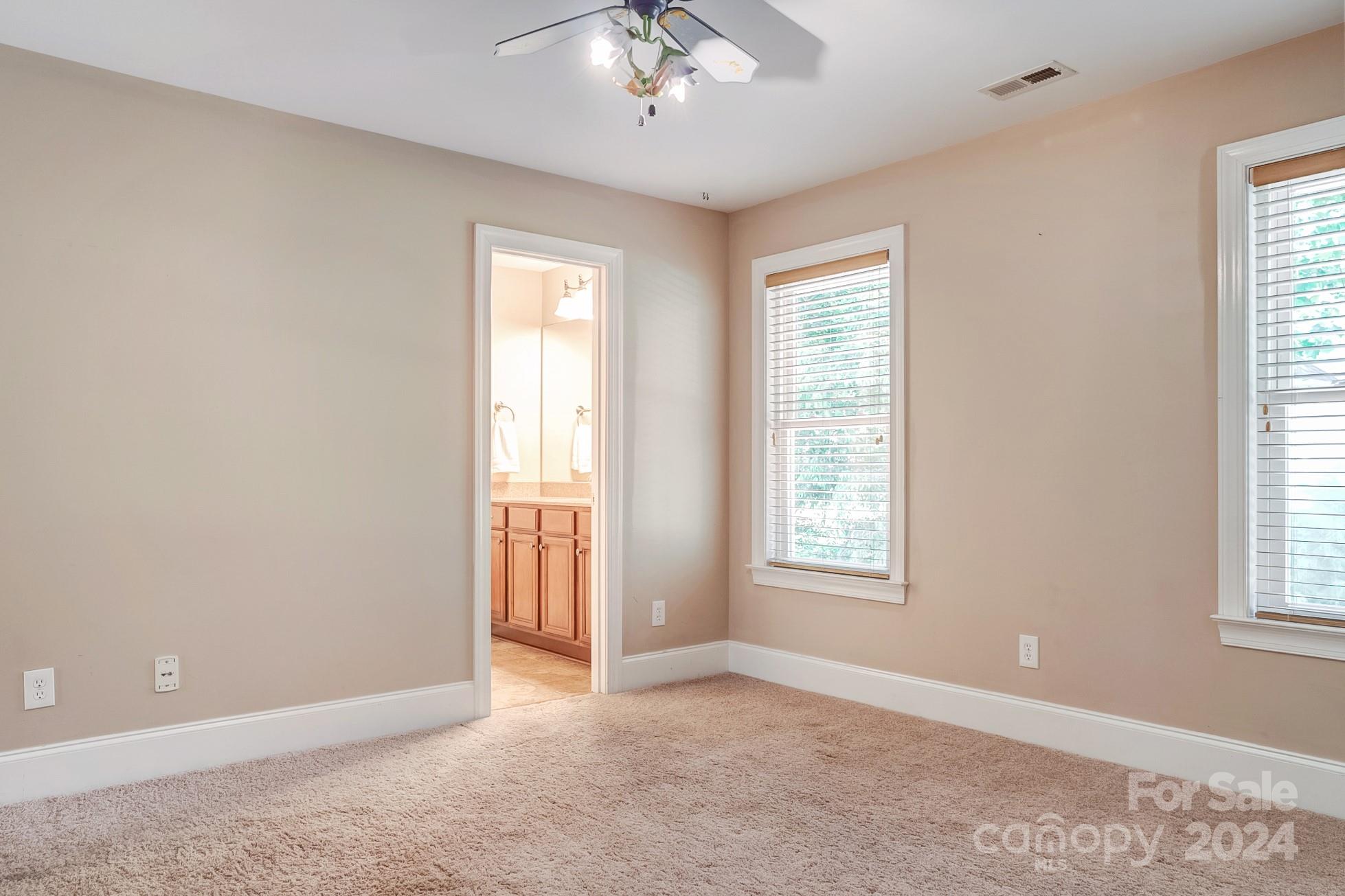 693 Normandy Road Mooresville, NC 28117 - Photo 40 of 48 a view of an empty room with a window