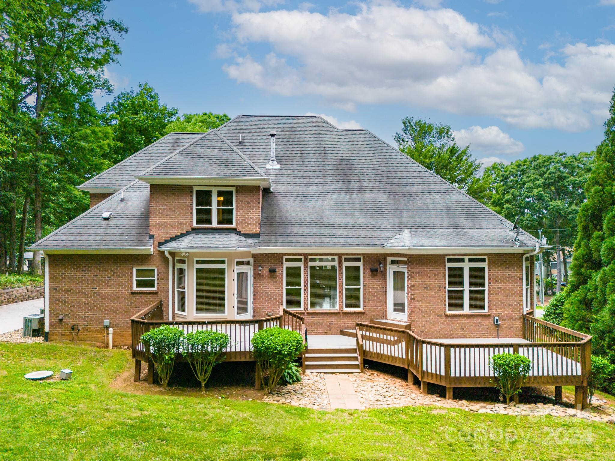 693 Normandy Road Mooresville, NC 28117 - Photo 47 of 48 a front view of a house with garden