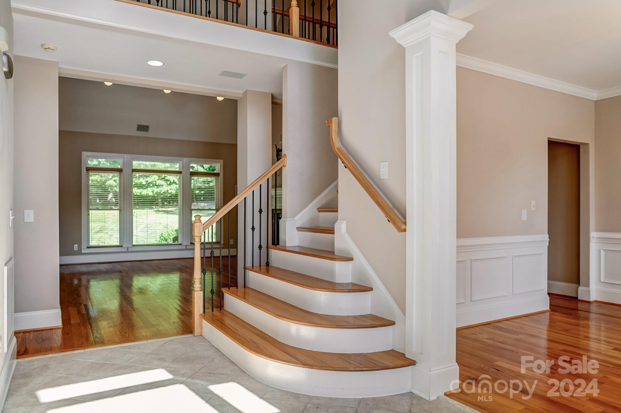 693 Normandy Road Mooresville, NC 28117 - Photo 7 of 48 a view of entryway and hall with wooden floor