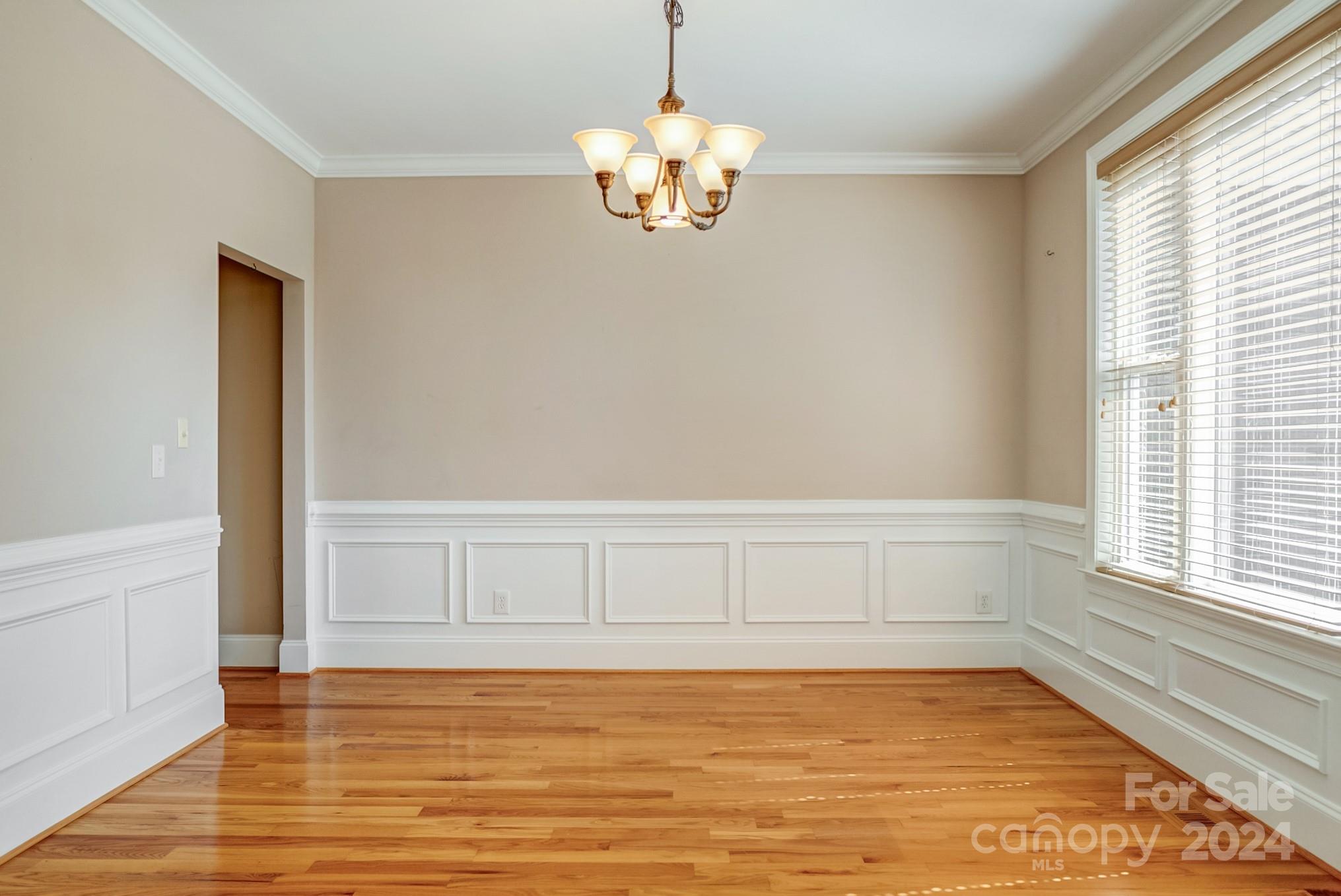 693 Normandy Road Mooresville, NC 28117 - Photo 9 of 48 a view of an empty room with a window
