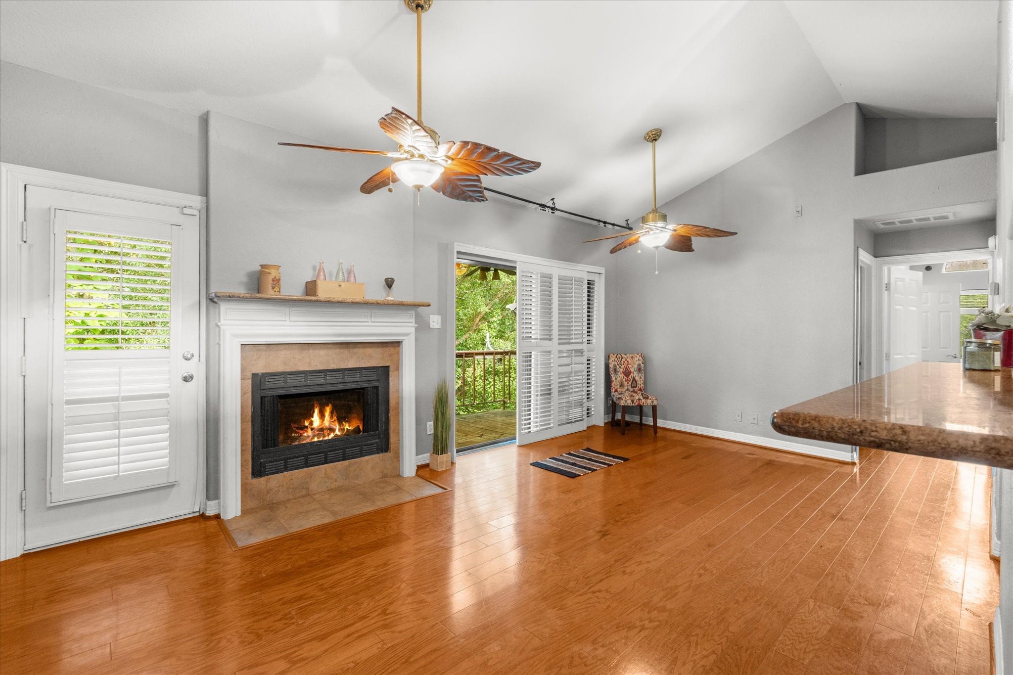 3500 Tangle Brush Drive, Unit 144 Spring, TX 77381 - Photo 3 of 14 Open concept with nicely conditioned hardwood floors, fireplace and vaulted ceilings.