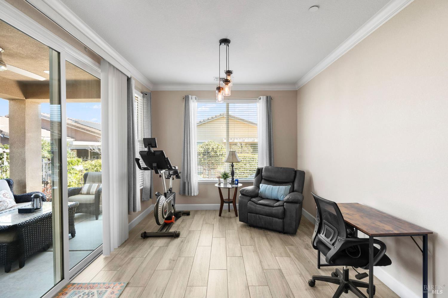 590 Belvedere Drive Rio Vista, CA 94571 - Photo 13 of 63 a living room with furniture and a chandelier