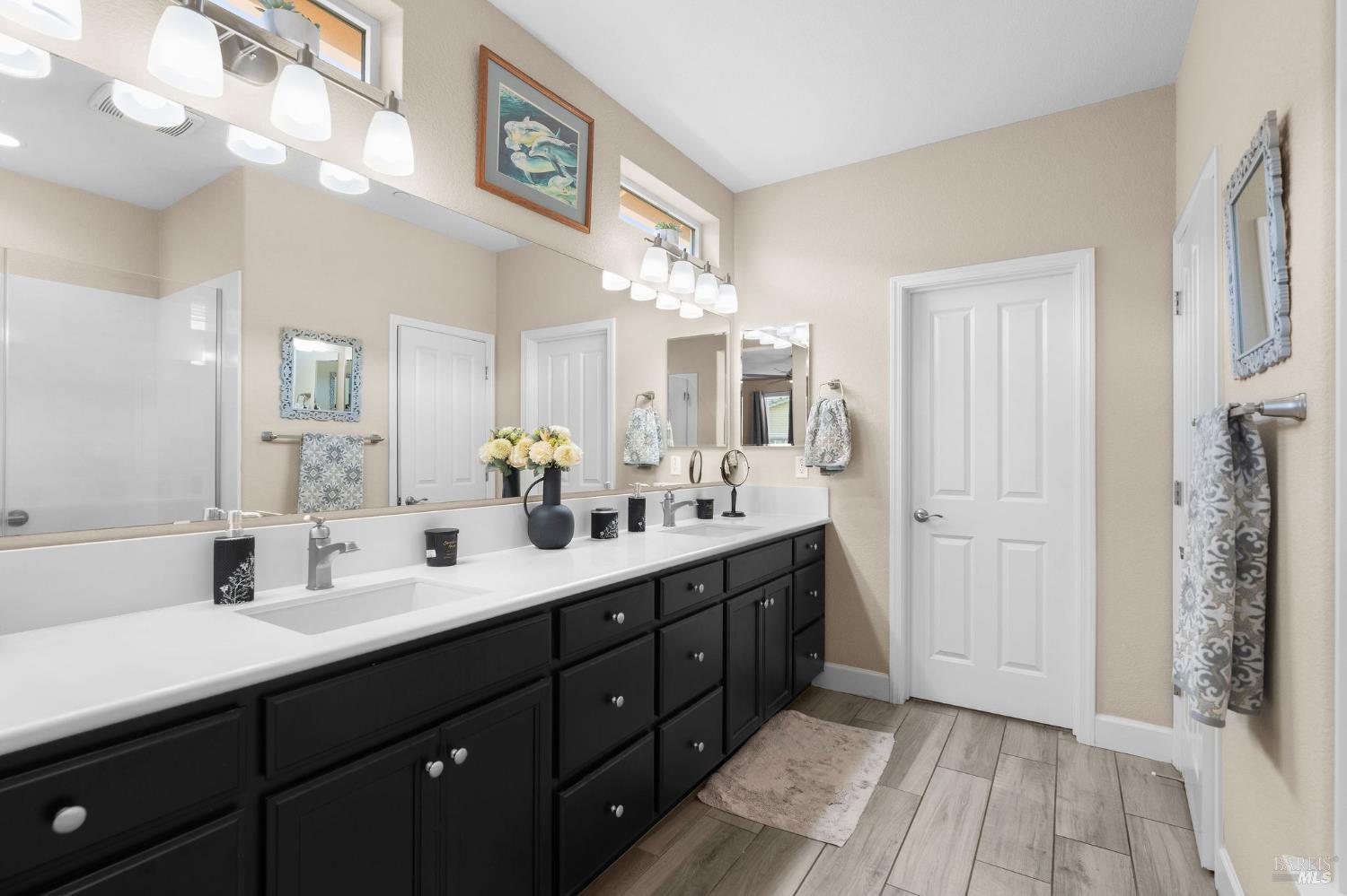 590 Belvedere Drive Rio Vista, CA 94571 - Photo 18 of 63 a spacious bathroom with a double vanity sink a mirror and a shower