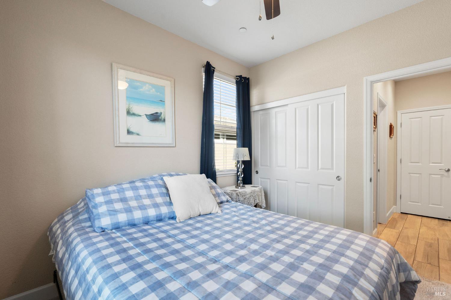 590 Belvedere Drive Rio Vista, CA 94571 - Photo 23 of 63 a bedroom with a large bed and a window