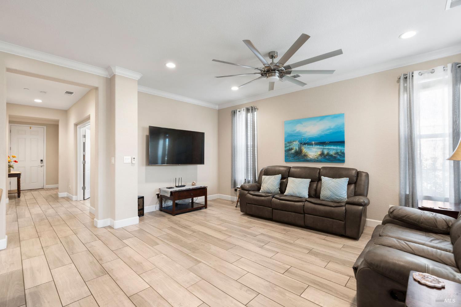 590 Belvedere Drive Rio Vista, CA 94571 - Photo 7 of 63 a living room with furniture and a flat screen tv