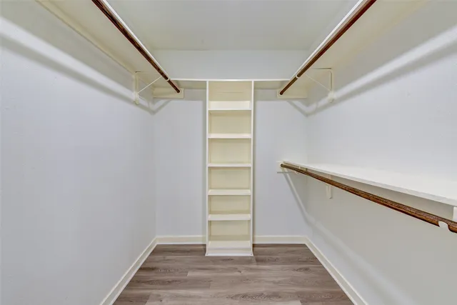 a view of an empty walk in closet