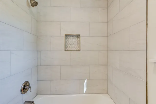 a bathroom with a bathtub