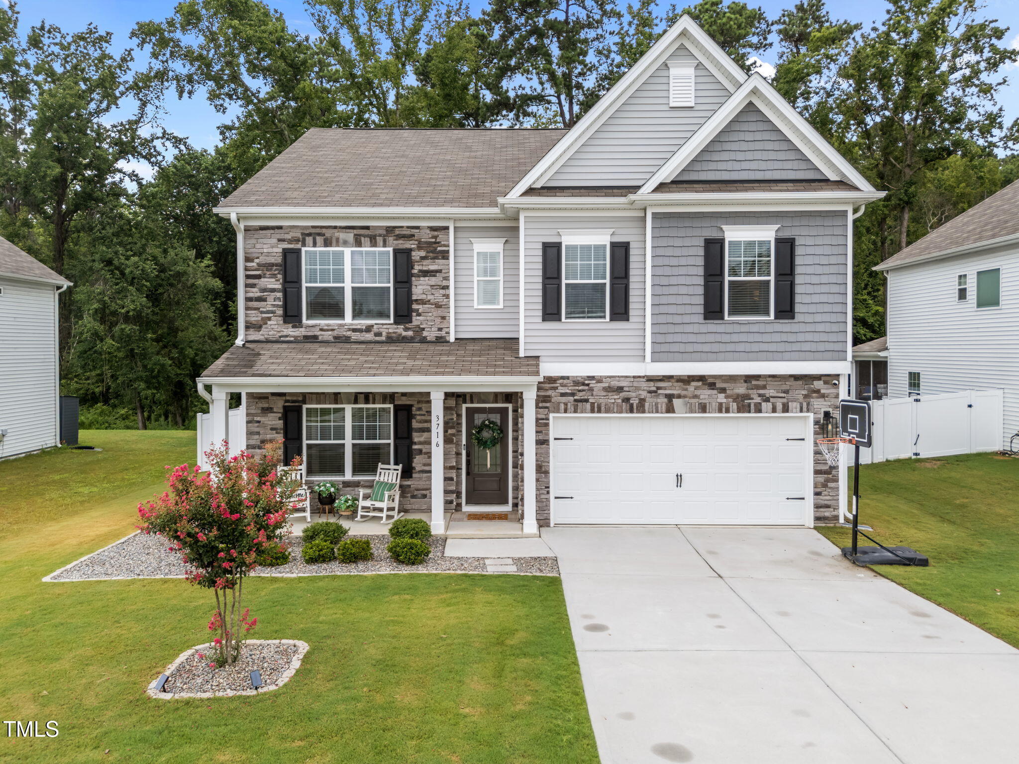3716 Cross Timber Lane Raleigh, NC 27603 - Photo 2 of 26 1-web-or-mls-DJI_20250801092321_0628_D