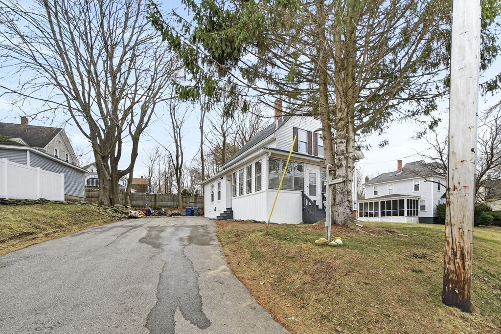 22 Maple Street Templeton, MA 01436 - Photo 5 of 28 a view of a yard with a large tree