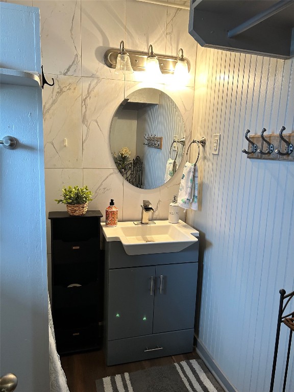 161 Alexander Drive, Unit 8 Tow, TX 78672 - Photo 10 of 13 a bathroom with a sink and a mirror