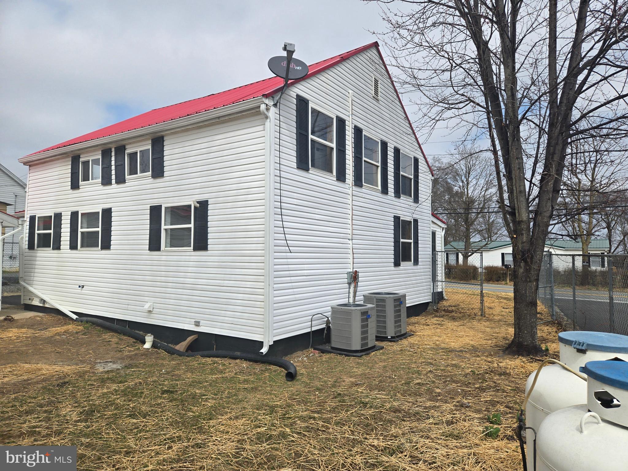 386 Specks Run Road Bunker Hill, WV 25413 - Photo 2 of 18 a view of a house with a patio