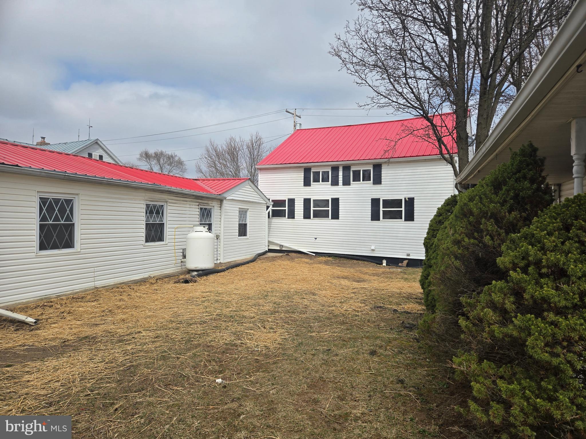 386 Specks Run Road Bunker Hill, WV 25413 - Photo 3 of 18 a view of a house with a yard