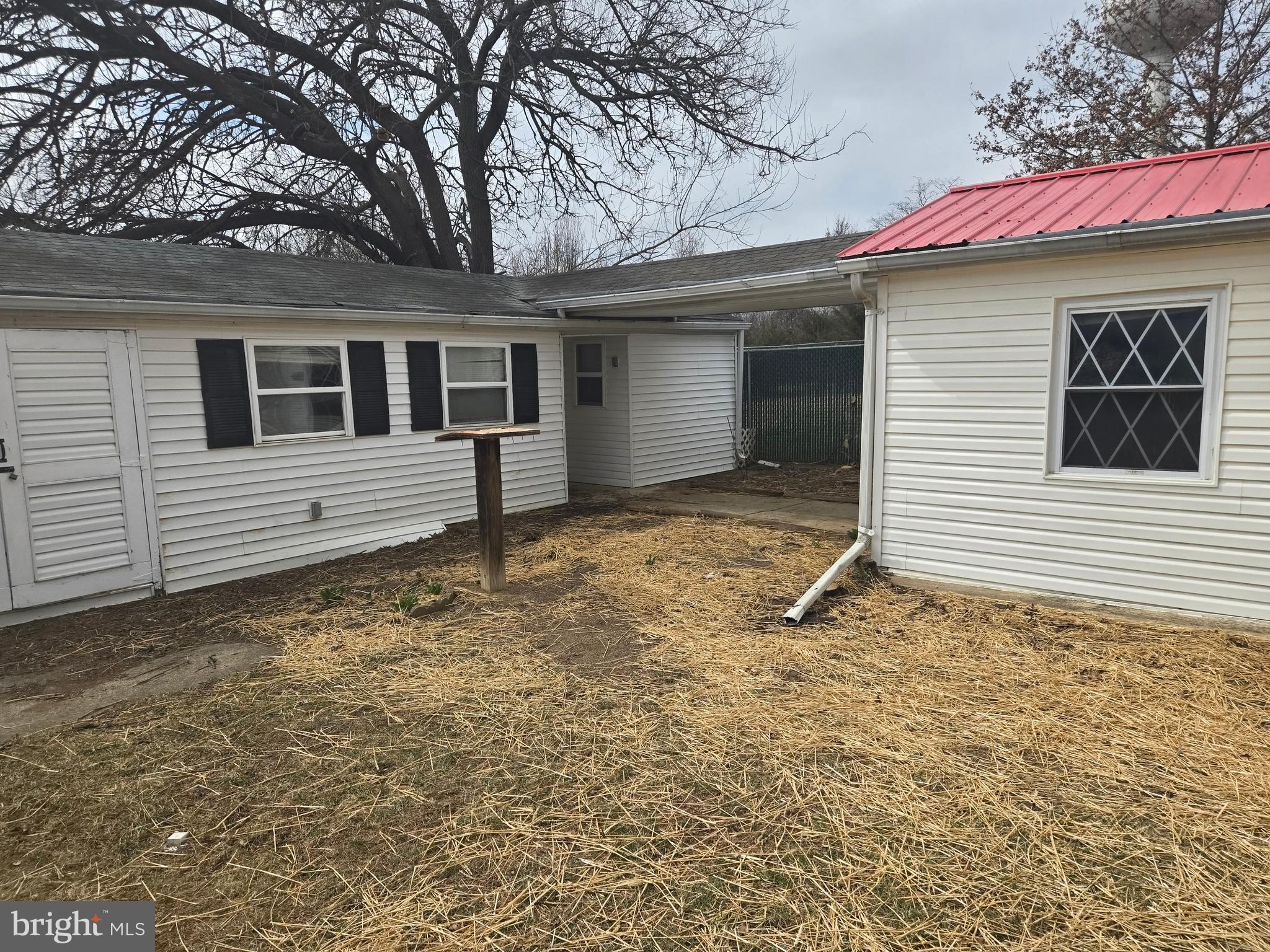 386 Specks Run Road Bunker Hill, WV 25413 - Photo 4 of 18 a backyard of a house
