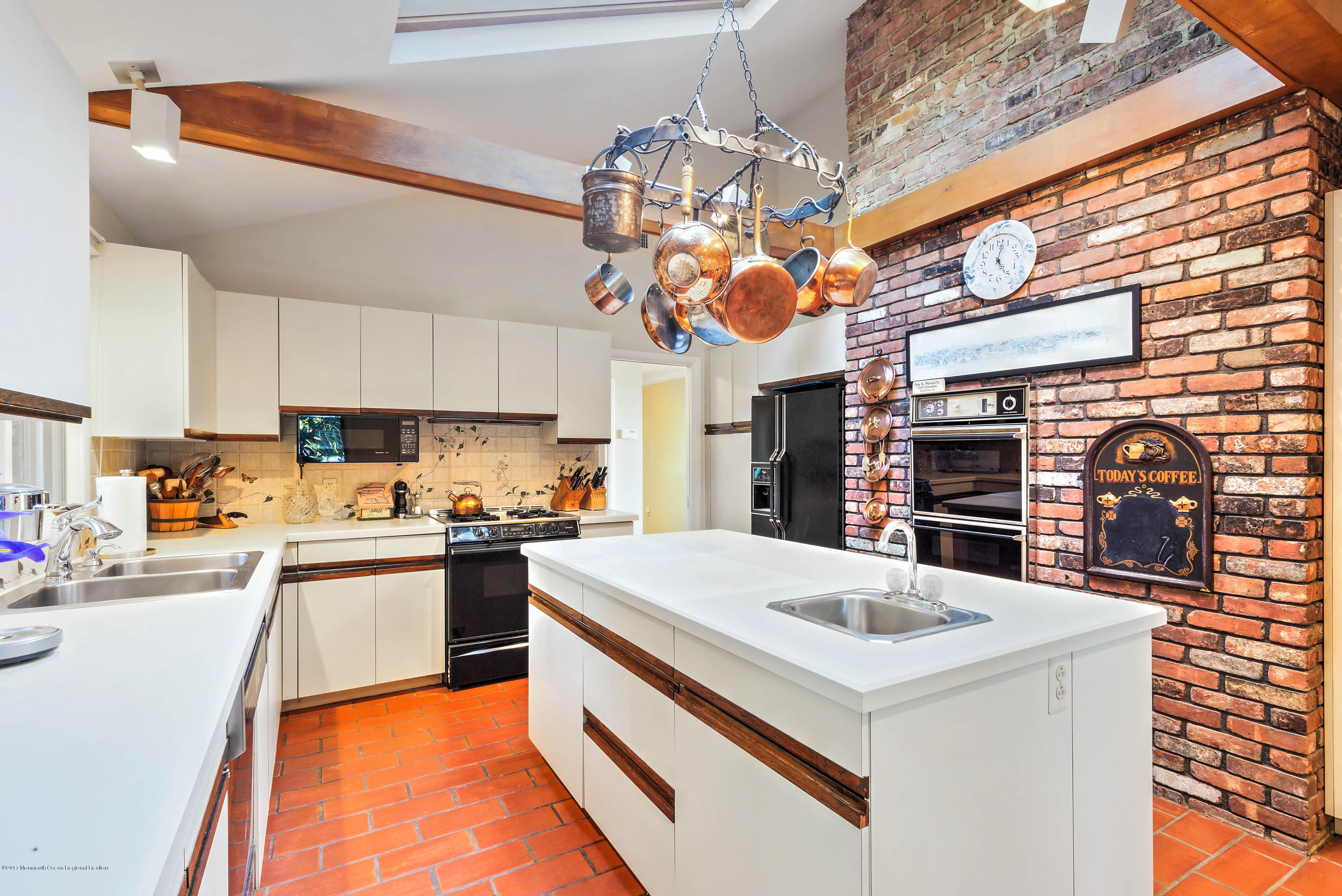 1 Hook Harbor Road Atlantic Highlands, NJ 07716 - Photo 11 of 40 a kitchen with stainless steel appliances granite countertop a sink a stove and a refrigerator