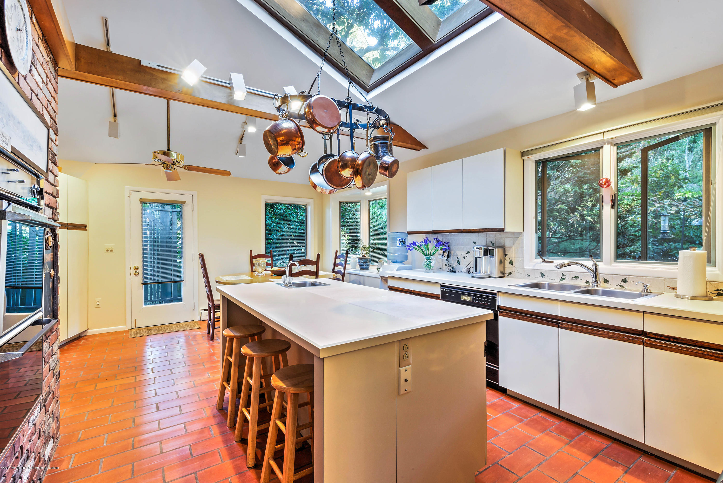 1 Hook Harbor Road Atlantic Highlands, NJ 07716 - Photo 12 of 40 a kitchen with a sink a counter top space and stainless steel appliances