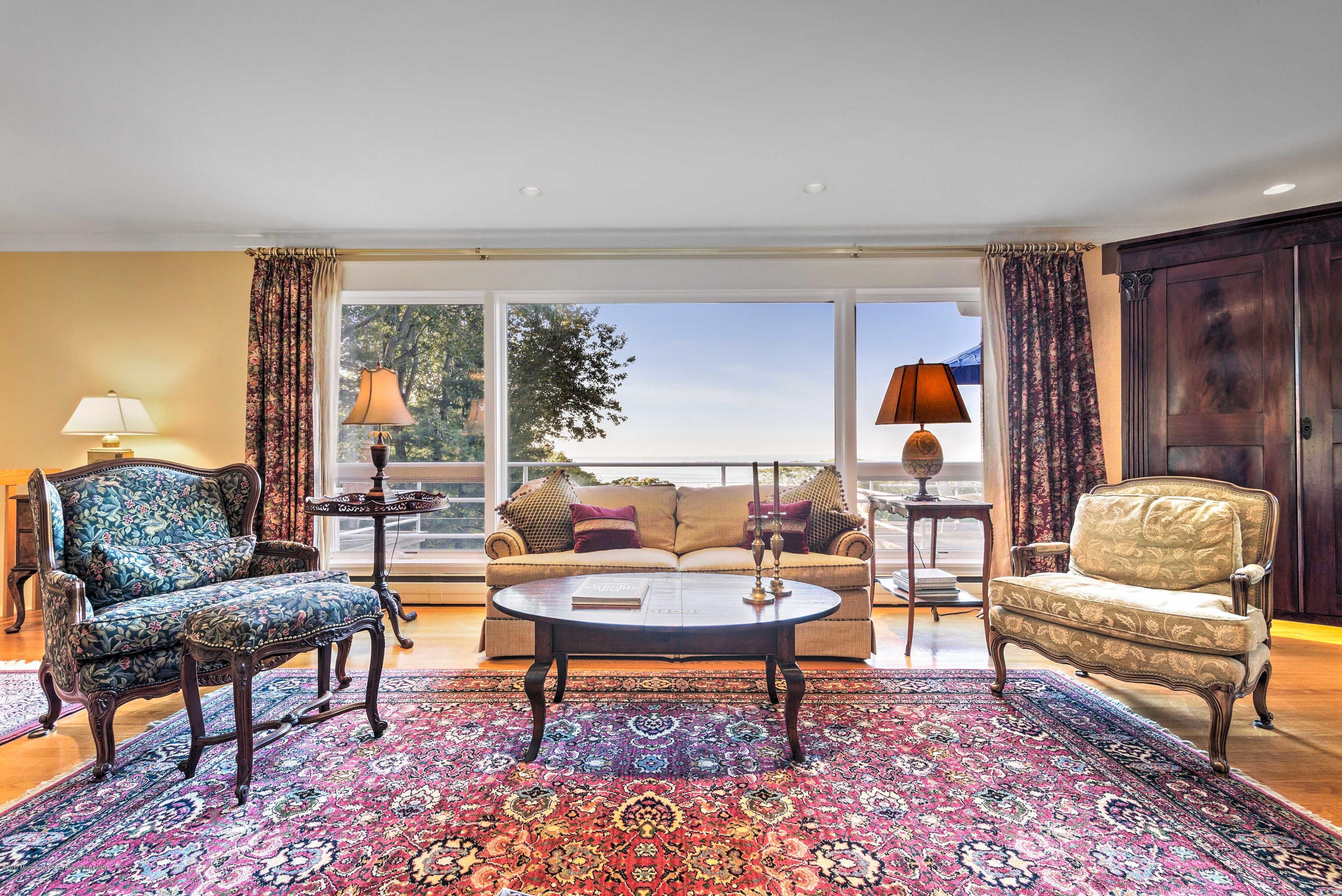 1 Hook Harbor Road Atlantic Highlands, NJ 07716 - Photo 15 of 40 a living room with furniture and a rug