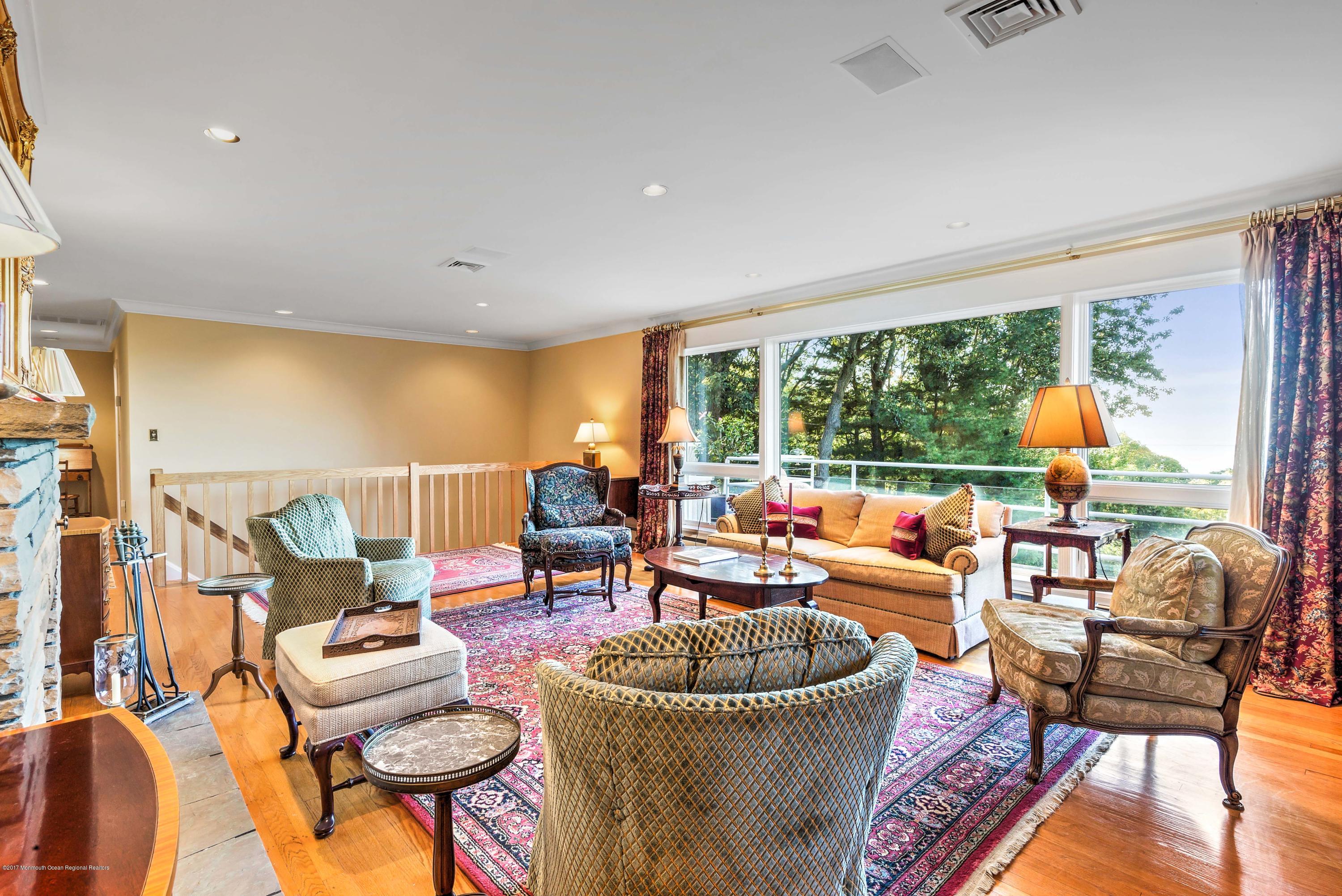 1 Hook Harbor Road Atlantic Highlands, NJ 07716 - Photo 16 of 40 a living room with furniture and a large window