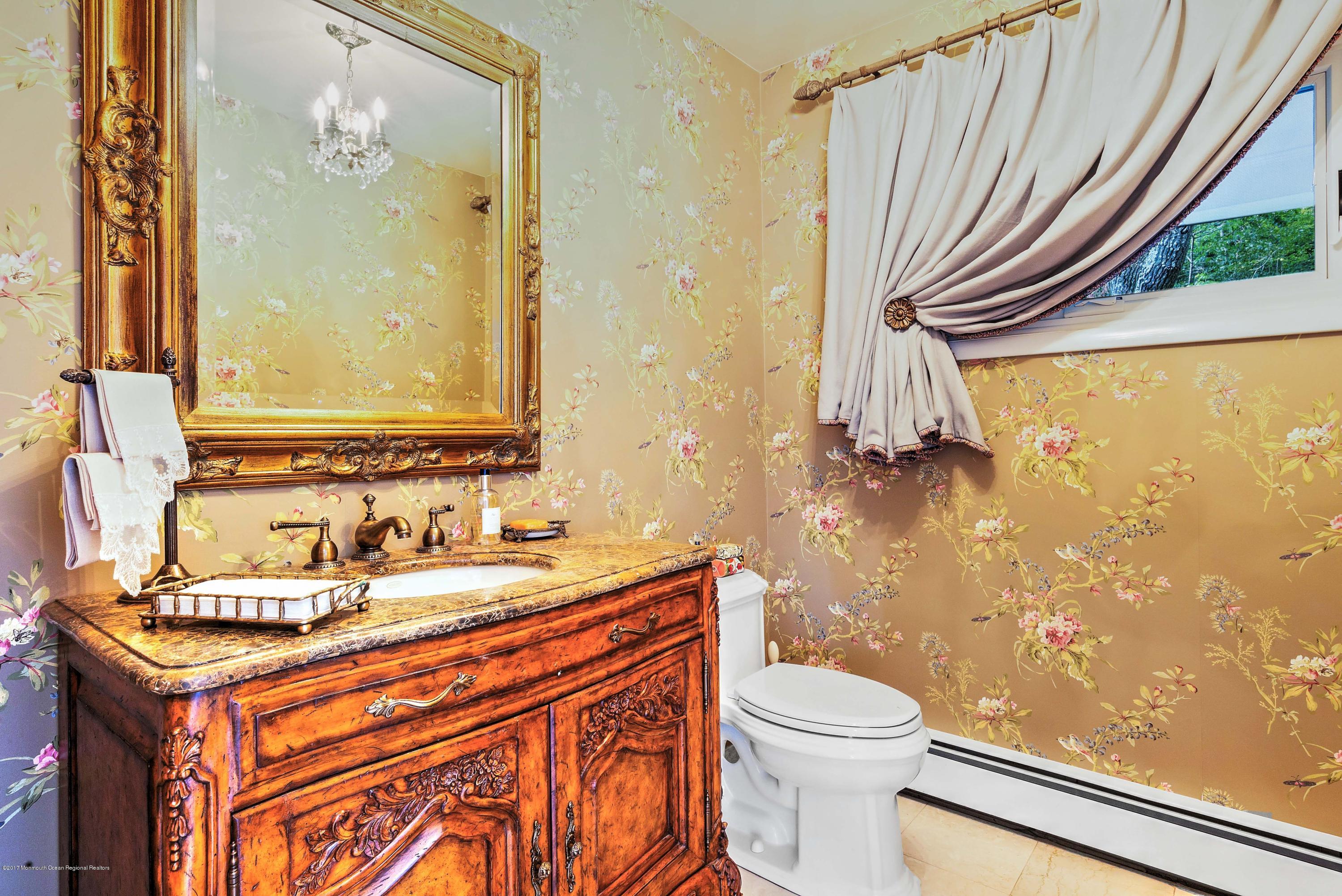 1 Hook Harbor Road Atlantic Highlands, NJ 07716 - Photo 20 of 40 a bathroom with a sink a toilet and shower