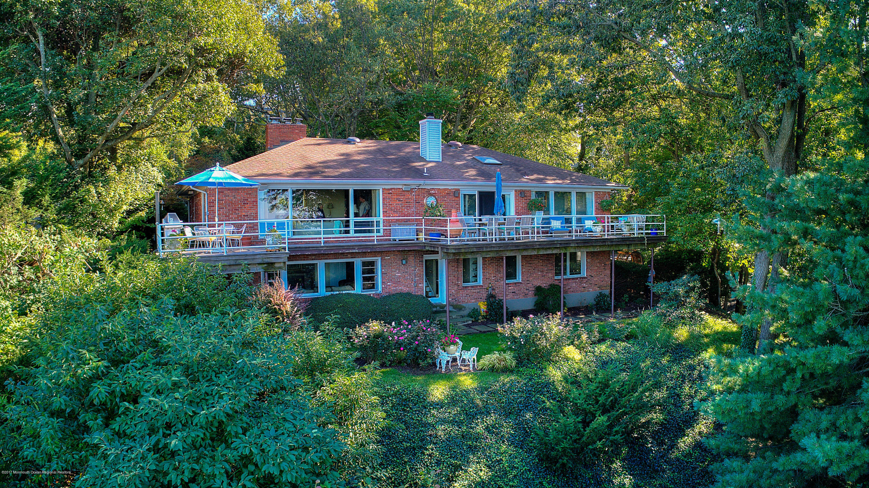 1 Hook Harbor Road Atlantic Highlands, NJ 07716 - Photo 2 of 40 a front view of a house with a yard