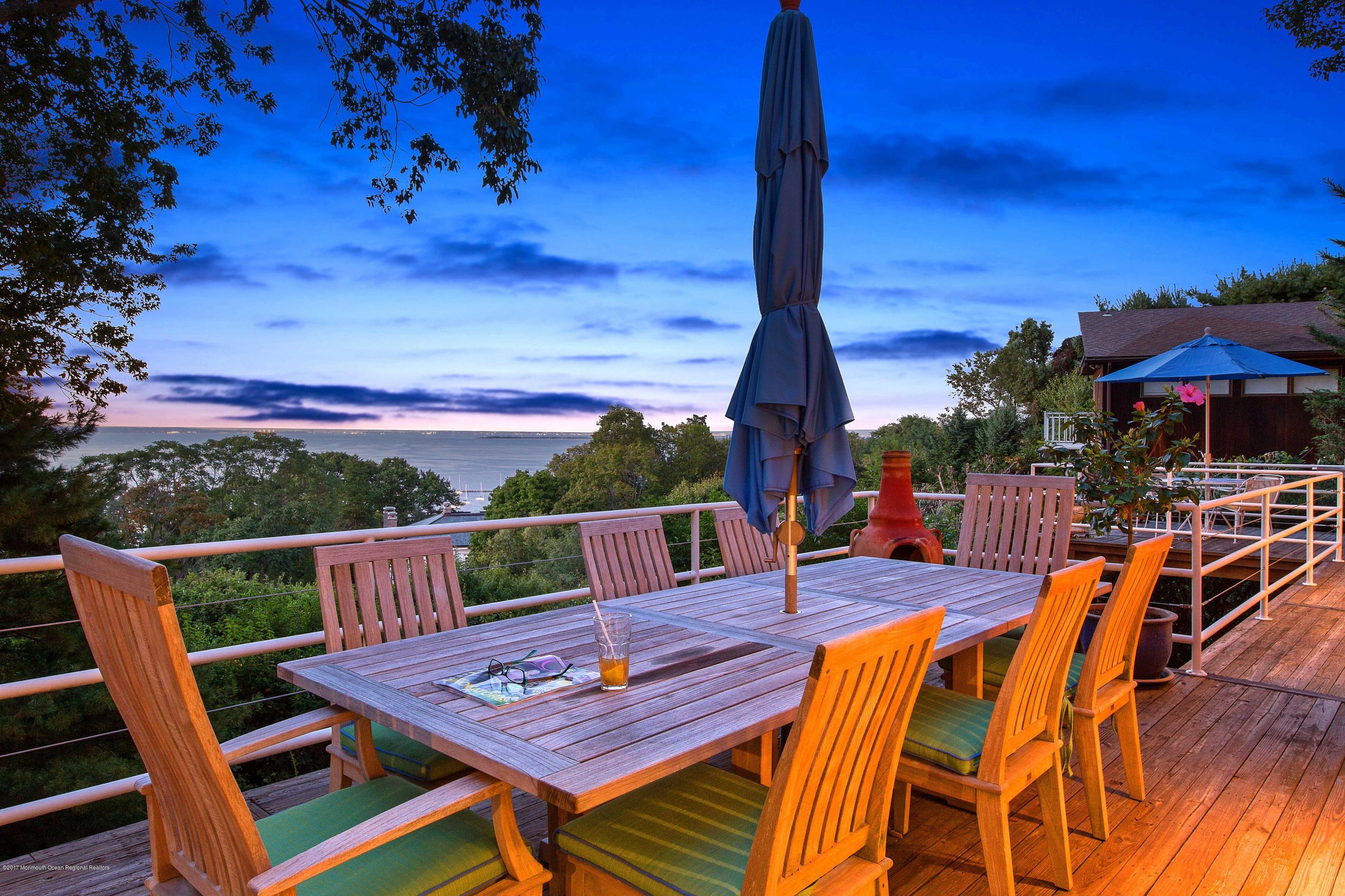 1 Hook Harbor Road Atlantic Highlands, NJ 07716 - Photo 32 of 40 a view of an outdoor sitting area with furniture