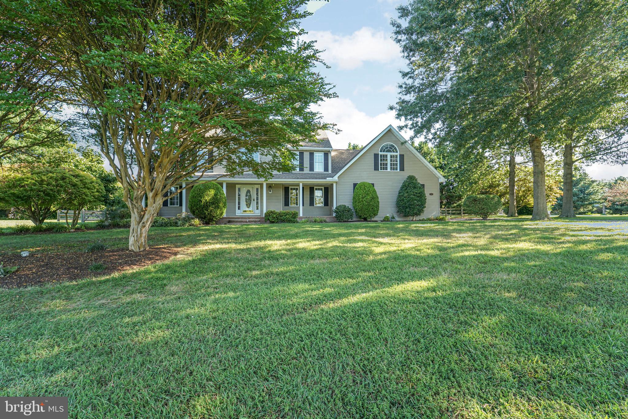 144 River Run Queenstown, MD 21658 - Photo 13 of 52 a front view of a house with a yard