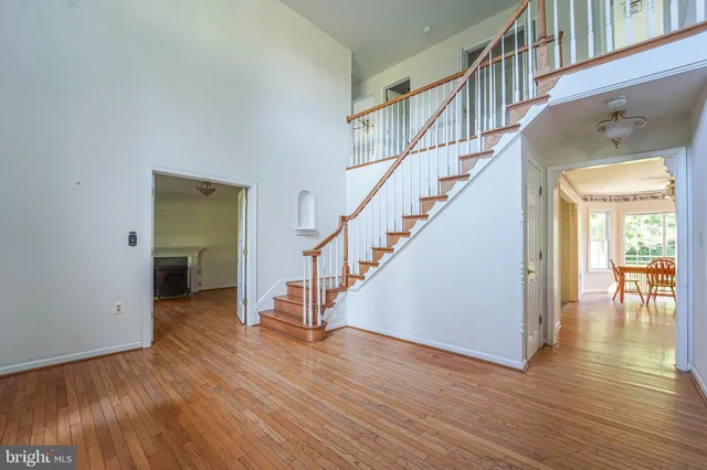 a view of entryway with wooden floor