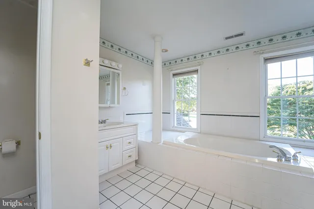 a view of a big room with windows