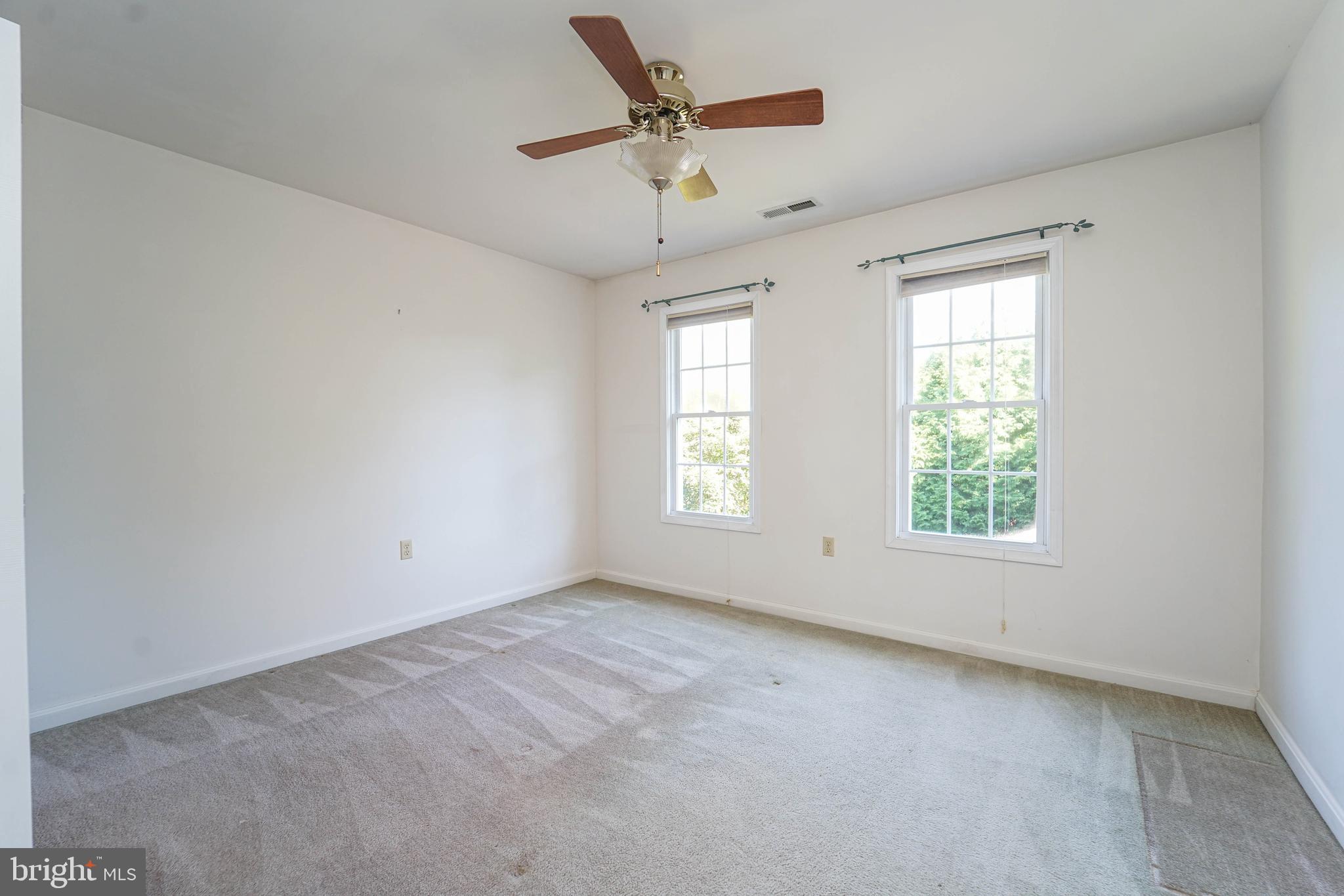 144 River Run Queenstown, MD 21658 - Photo 45 of 52 a view of an empty room with a window