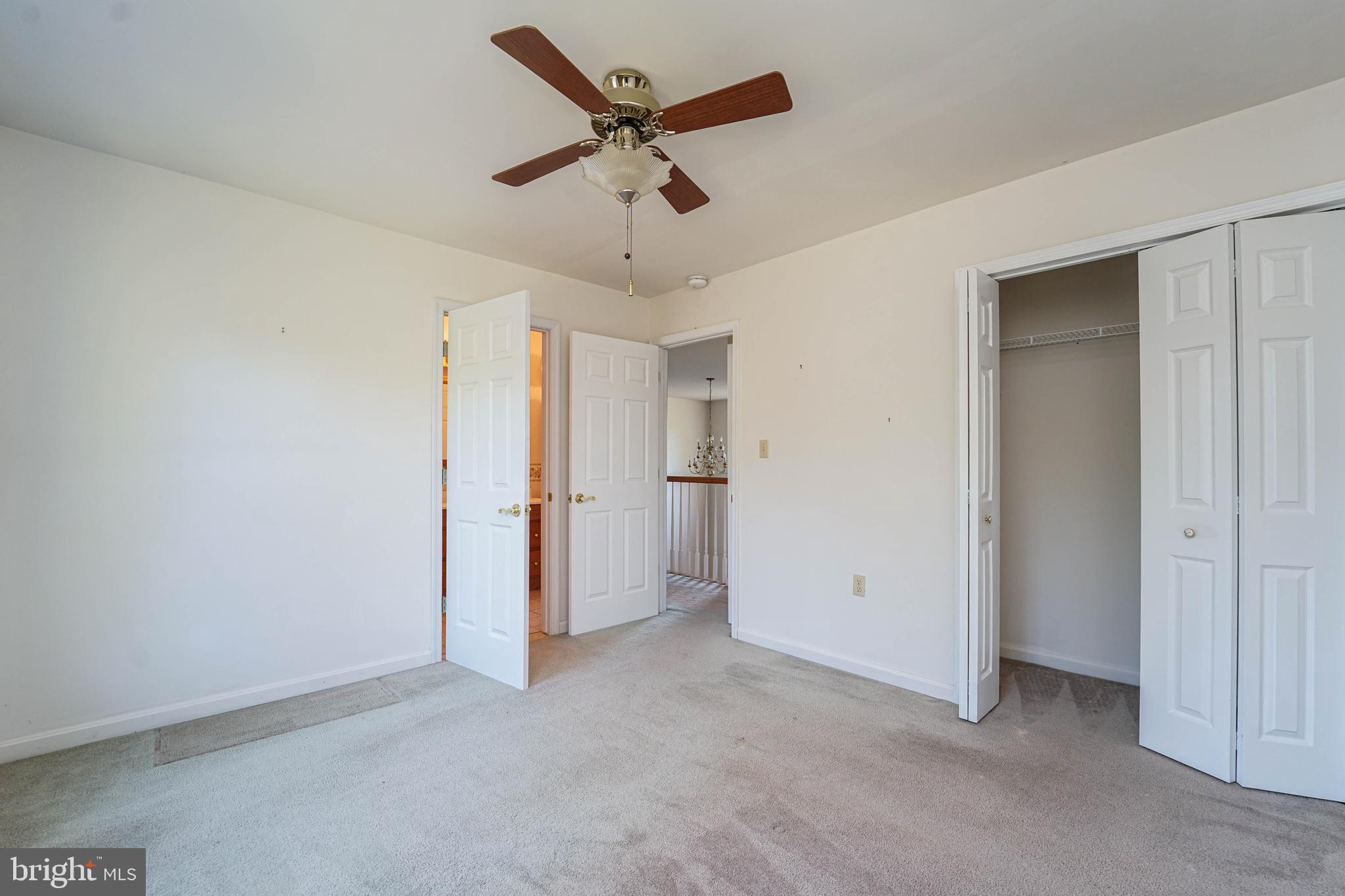 144 River Run Queenstown, MD 21658 - Photo 47 of 52 a view of a livingroom with a ceiling fan