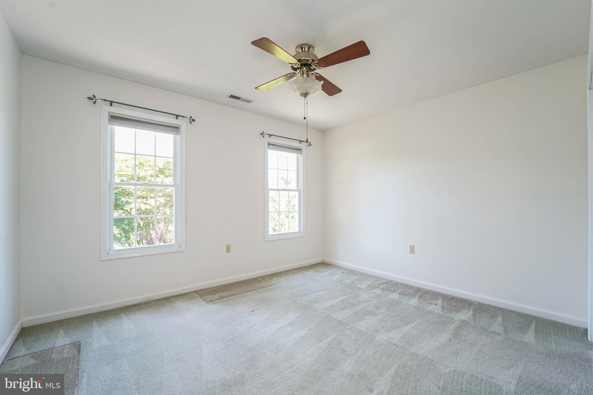 144 River Run Queenstown, MD 21658 - Photo 48 of 52 a view of an empty room with a window