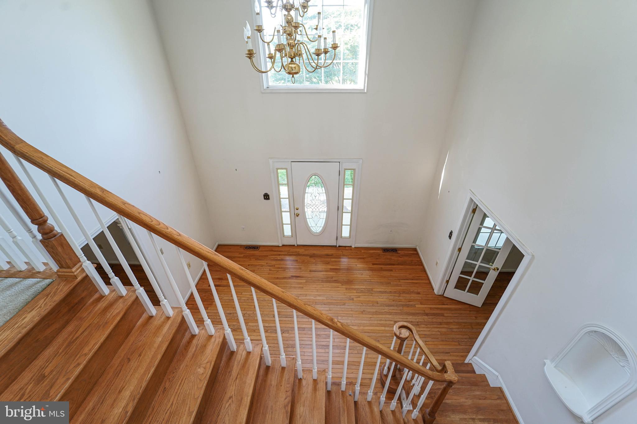 144 River Run Queenstown, MD 21658 - Photo 50 of 52 a view of a hallway with wooden floor
