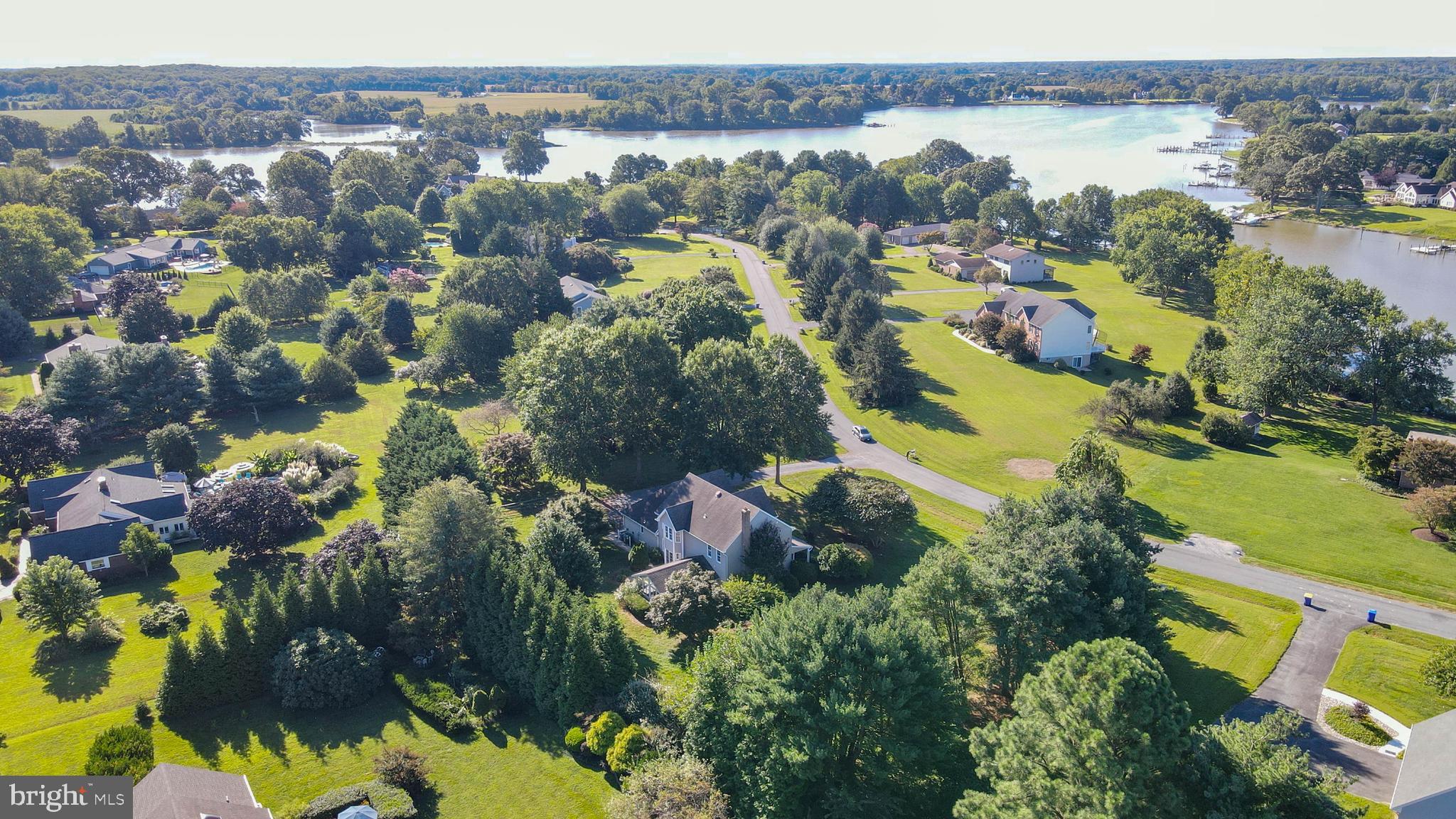 144 River Run Queenstown, MD 21658 - Photo 5 of 52 an aerial view of lake and residential houses with outdoor space