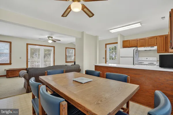a view of a dining room with furniture