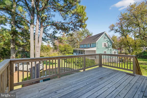 a view of a wooden roof deck