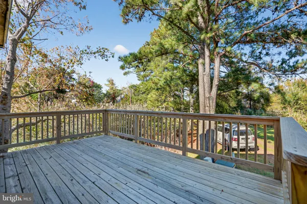 a view of balcony with wooden floor