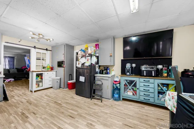 a view of a room with storage and utility room
