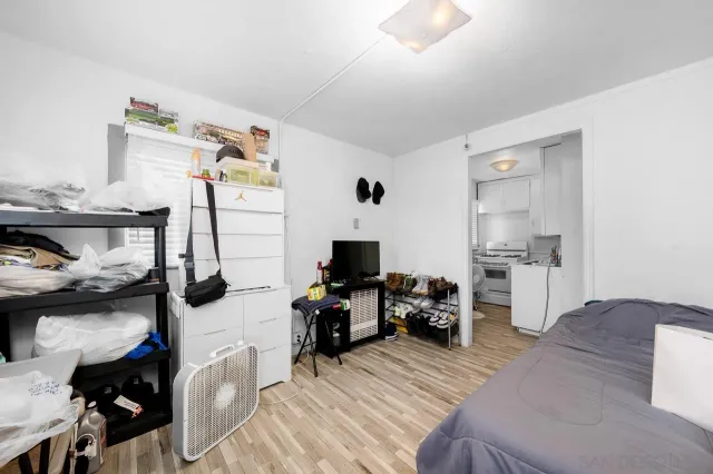 a bedroom with furniture and a bed