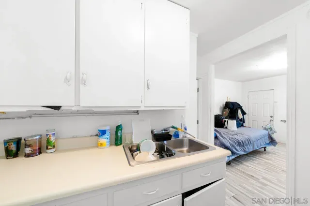 a bedroom with a bed and a closet