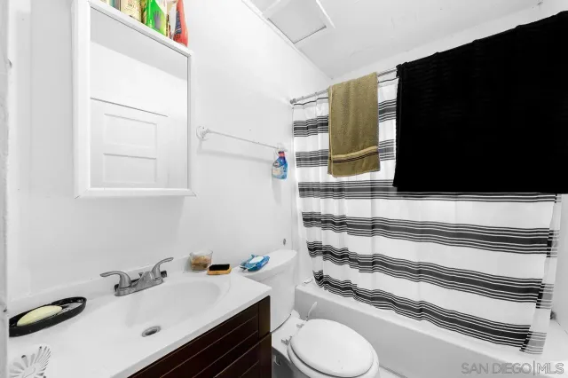 a room with furniture and flat screen tv