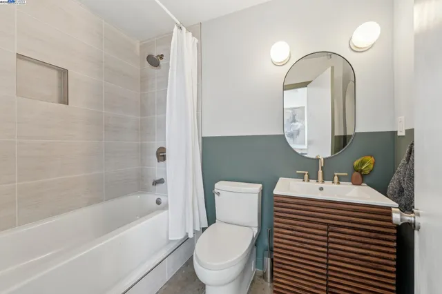 a bedroom with a bed and a bookshelf