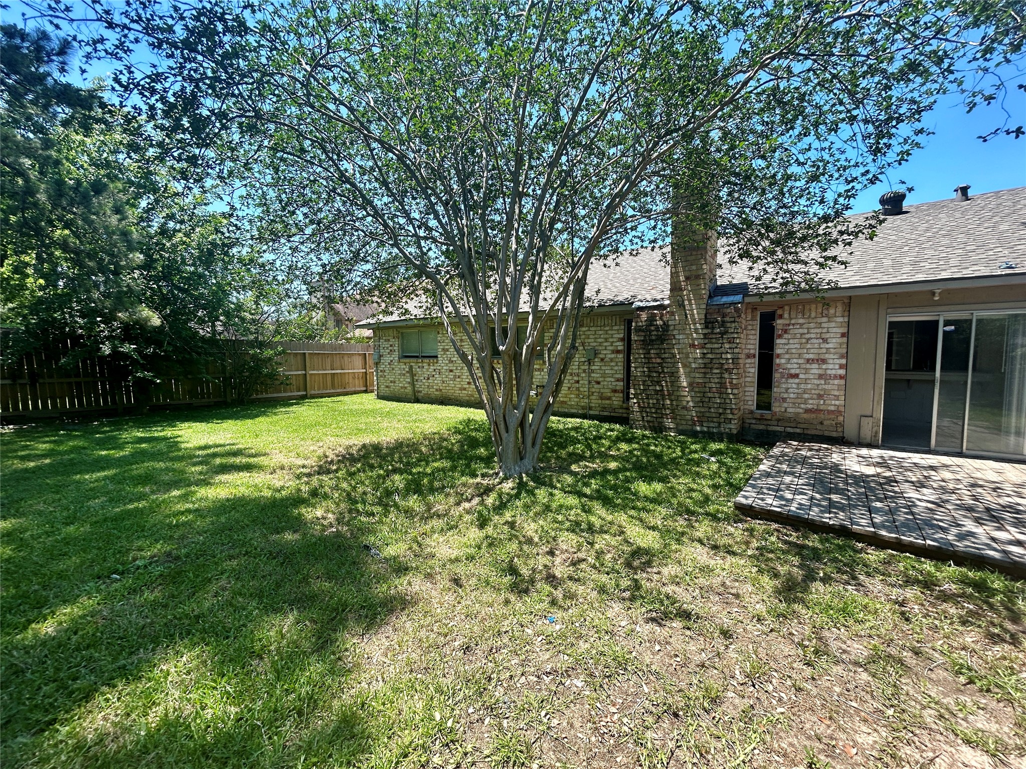 2510 Knollbrook Lane Spring, TX 77373 - Photo 24 of 24 a view of backyard of house with green space