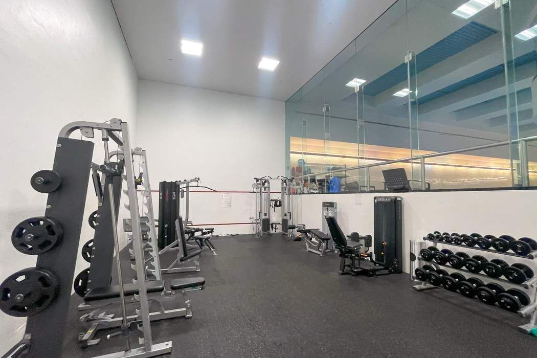 161 West 61st Street, Unit 15E Manhattan, NY 10023 - Photo 20 of 24 a view of a room with gym equipment