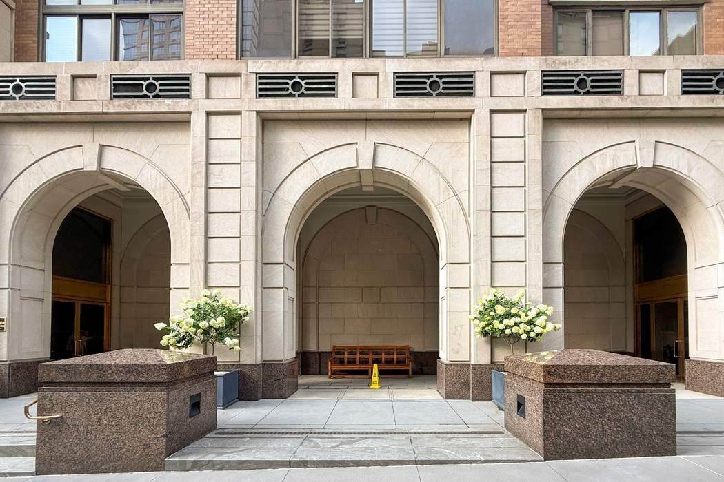 161 West 61st Street, Unit 15E Manhattan, NY 10023 - Photo 23 of 24 a view of a house with potted plants