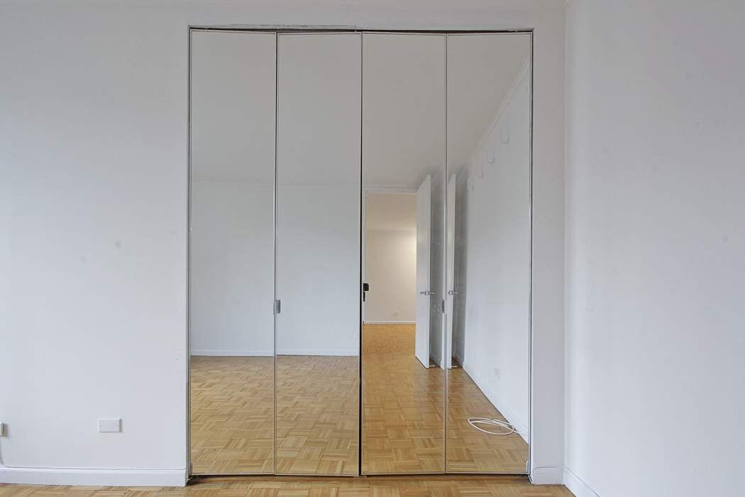 161 West 61st Street, Unit 15E Manhattan, NY 10023 - Photo 6 of 24 a view of an empty room