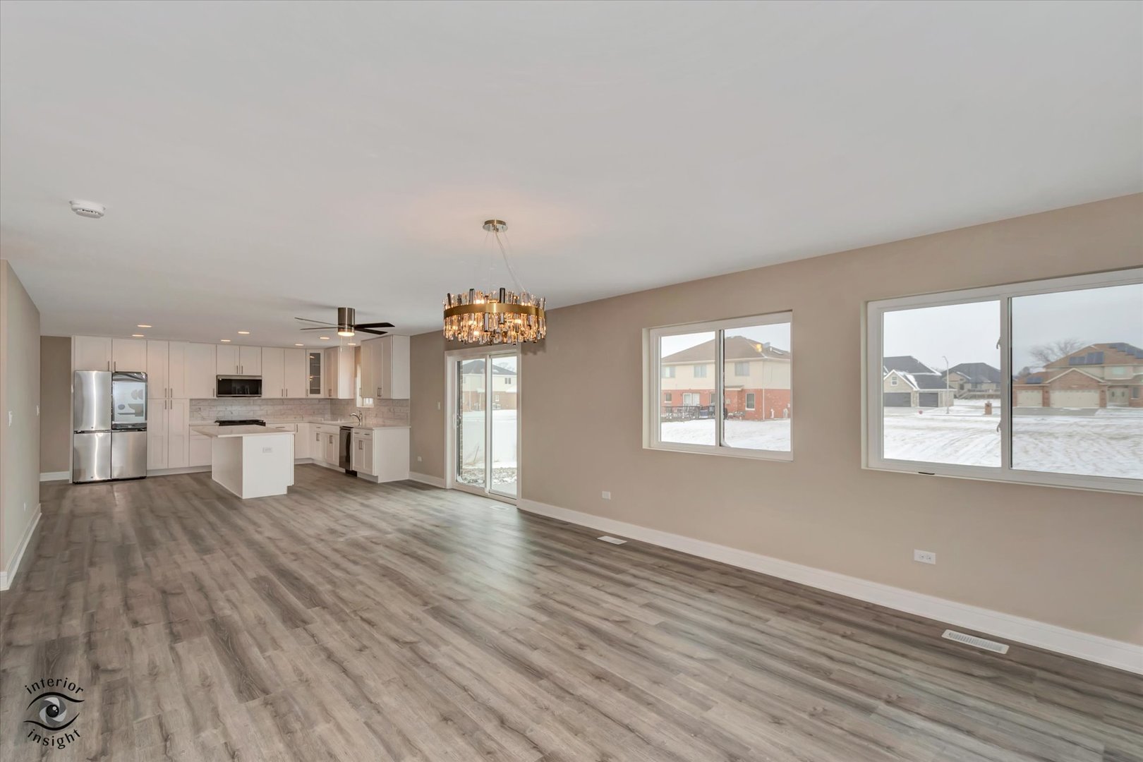 4996 Ribbon Drive Monee, IL 60449 - Photo 11 of 28 wooden floor in an empty room with a window