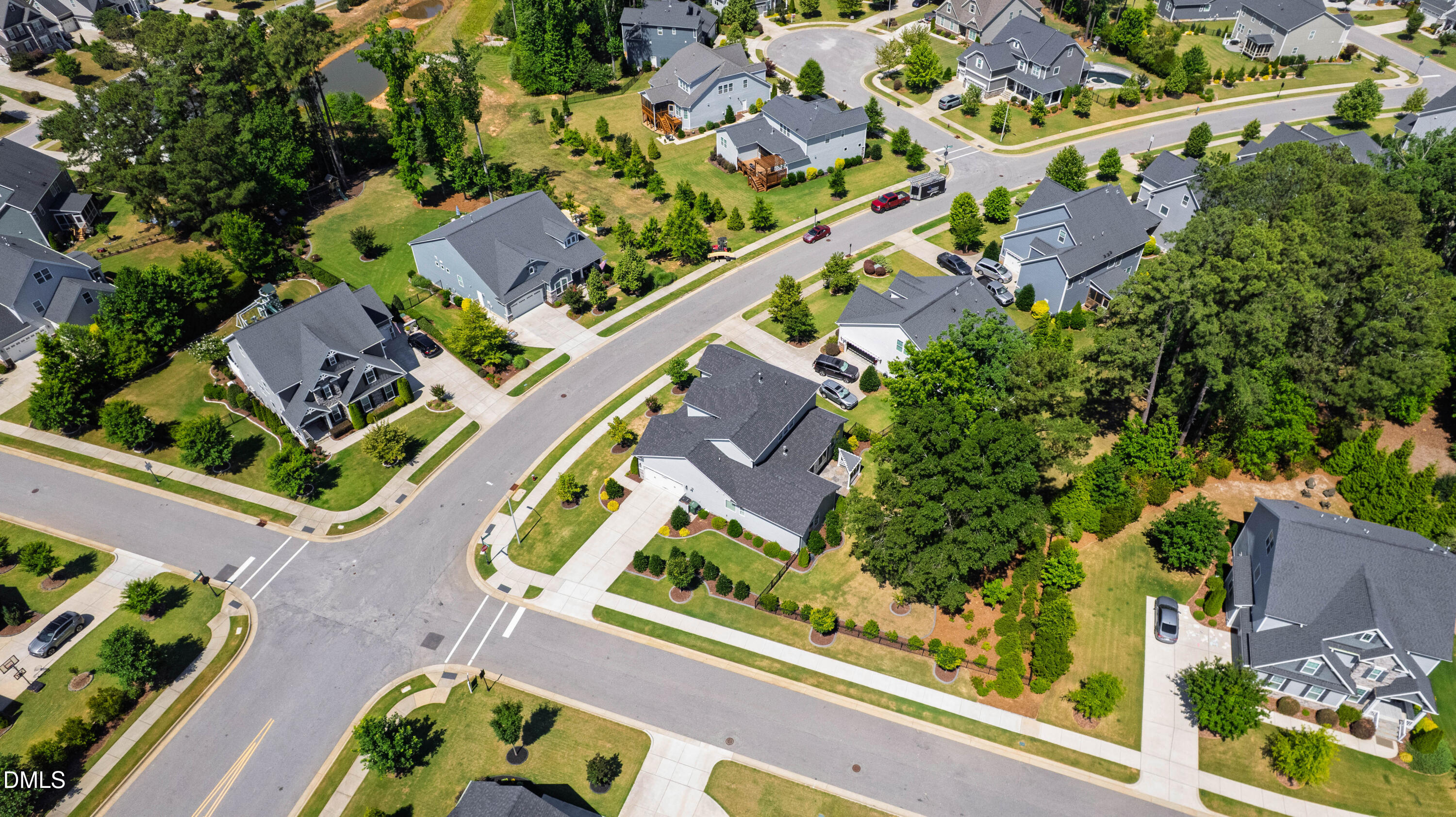 1300 Commons Ford Place Apex, NC 27539 - Photo 68 of 70 an aerial view of a house with a yard
