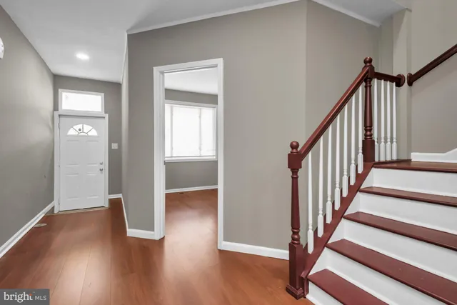 a view of entryway with wooden floor