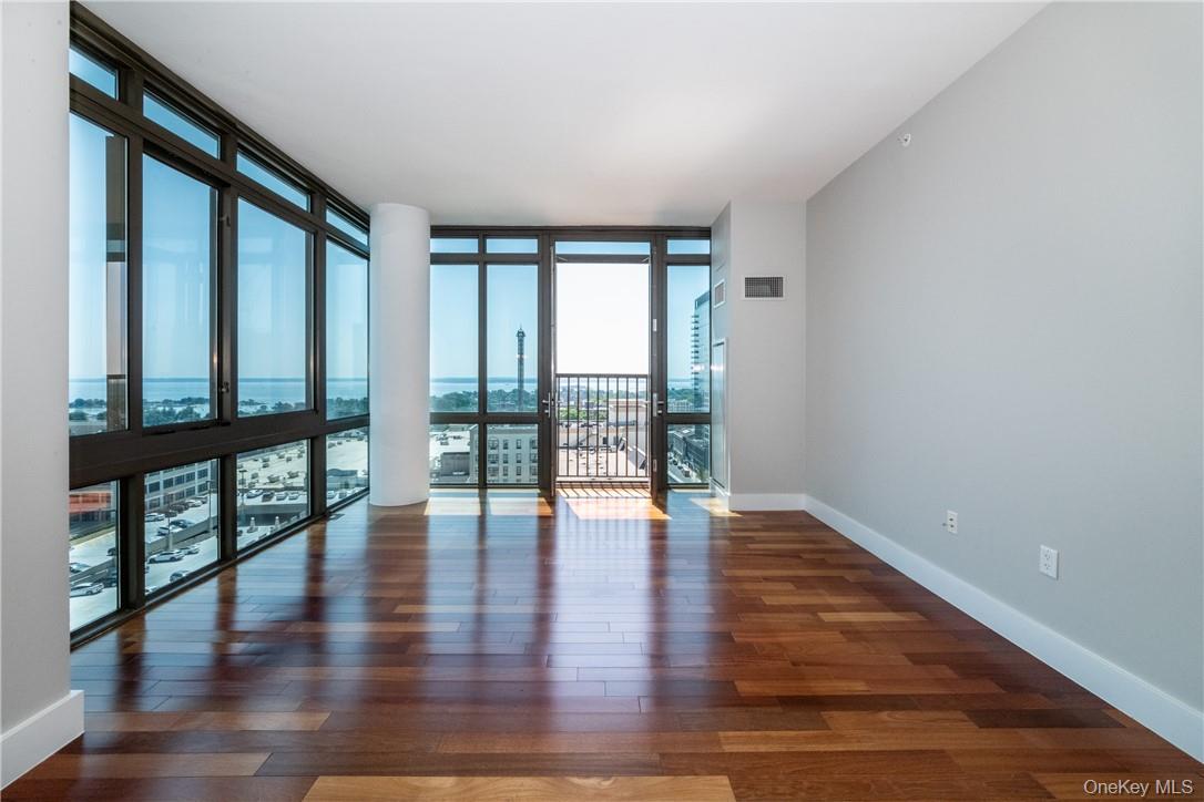 175 Huguenot Street, Unit 1802 New Rochelle, NY 10801 - Photo 7 of 31 a view of an entryway with wooden floor